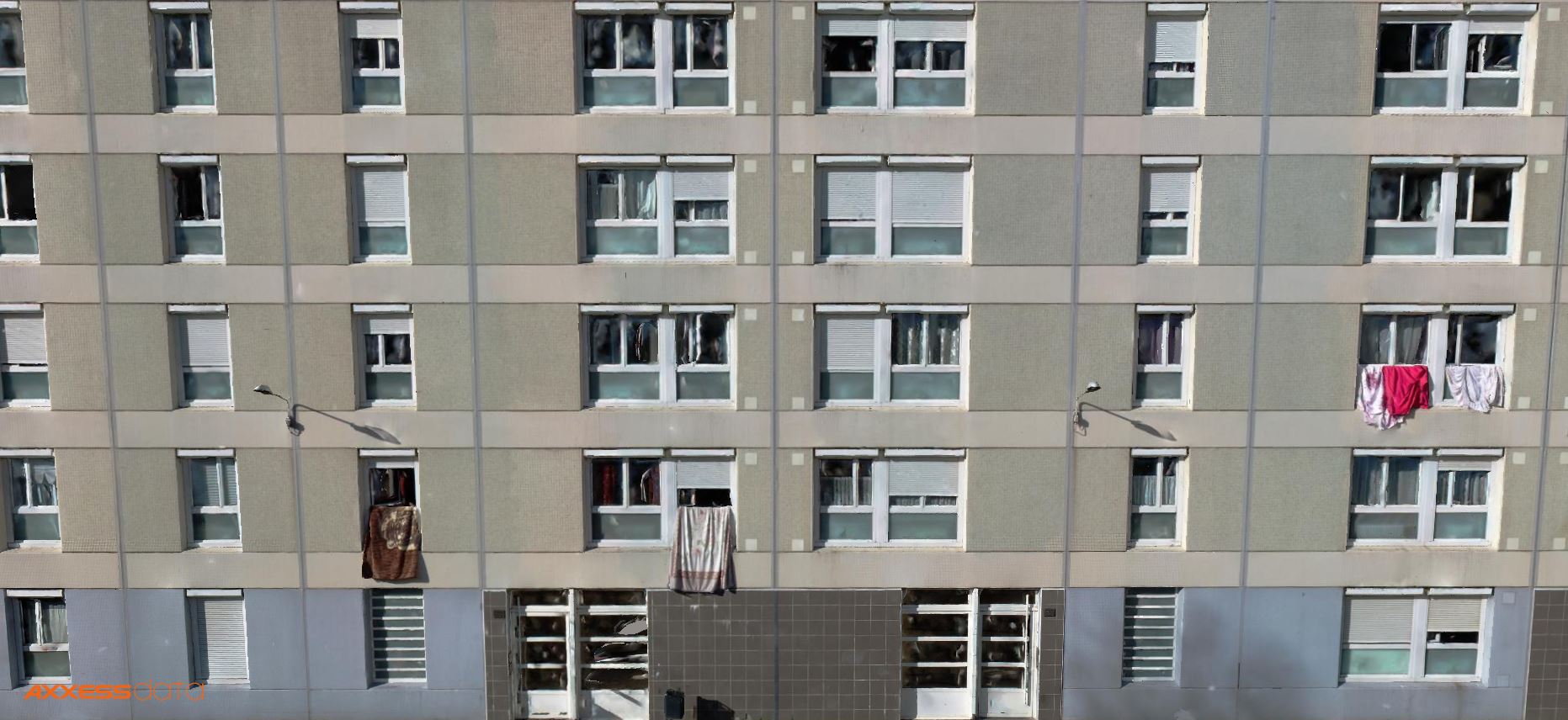 Photogrammétrie par drone d'une façade d'immeuble résidentiel dans le cadre d'un relevé 3D